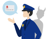 警察官に扮した詐欺師が観光客に声をかけている様子